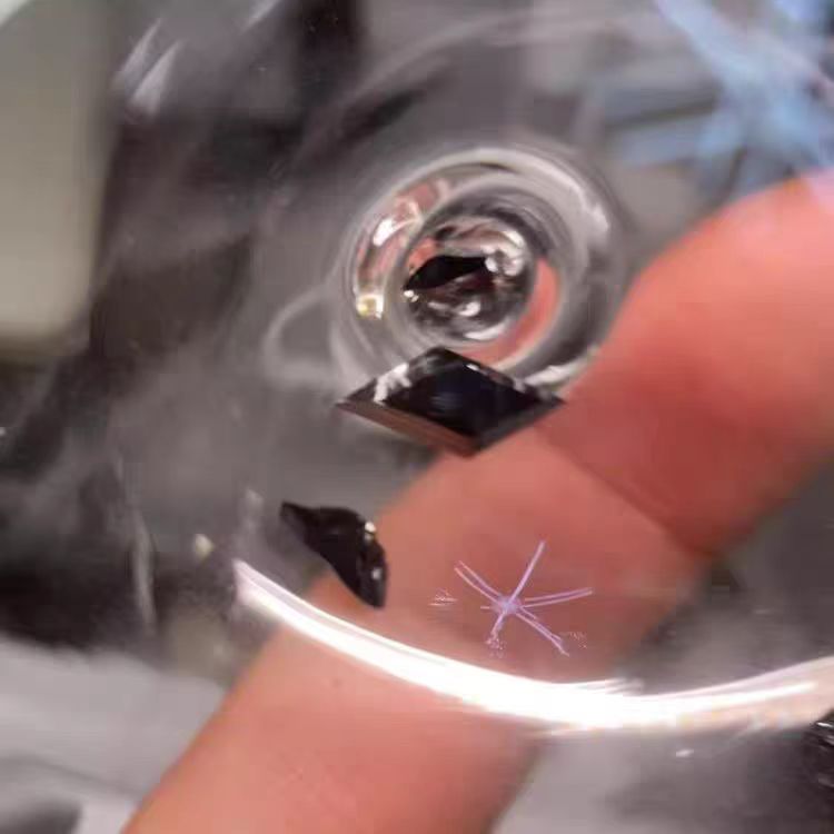A glass sphere encapsulating iodine